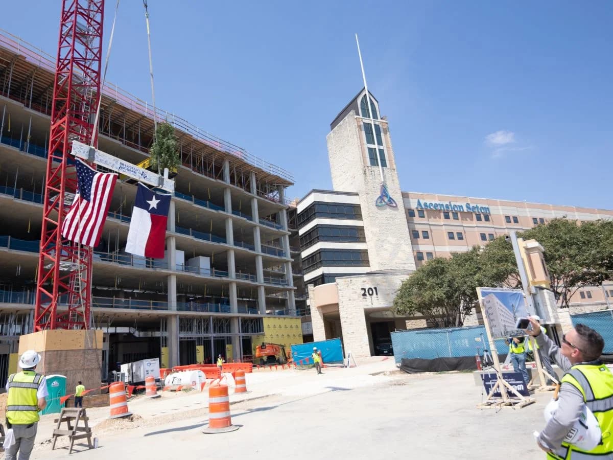 Concrete crew setting rebar and formwork on a commercial slab in Tyler, Texas